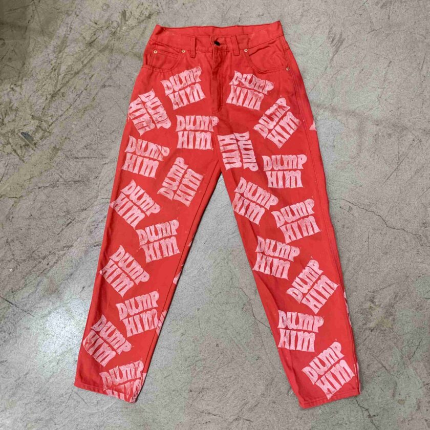 a pair of red pants with white letters on them.