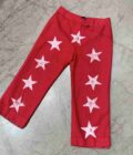 a pair of red pants with white stars on them.