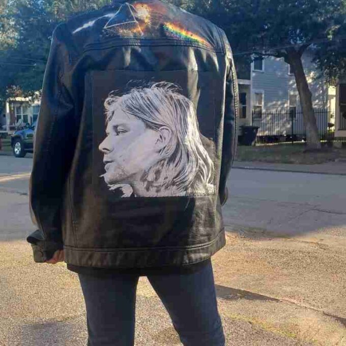 a person wearing a jacket with a picture of a person on it.