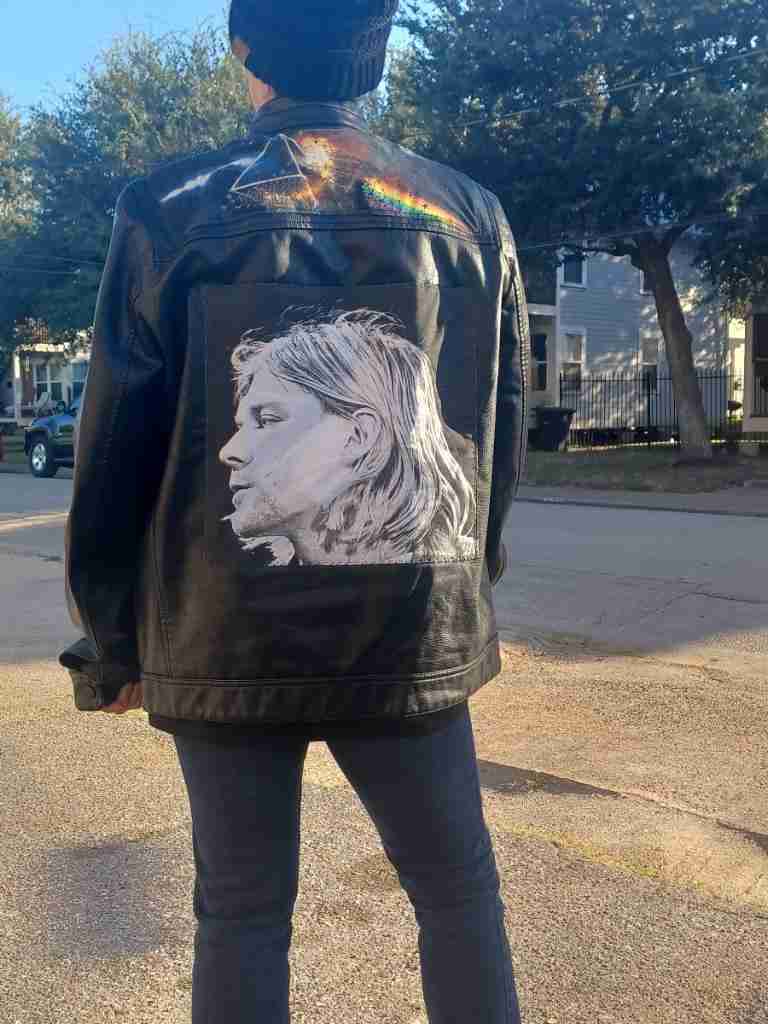 a person wearing a jacket with a picture of a person on it.