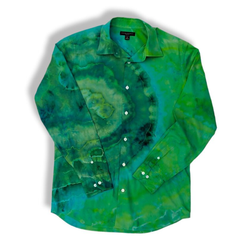 a green shirt with a blue swirl on it.