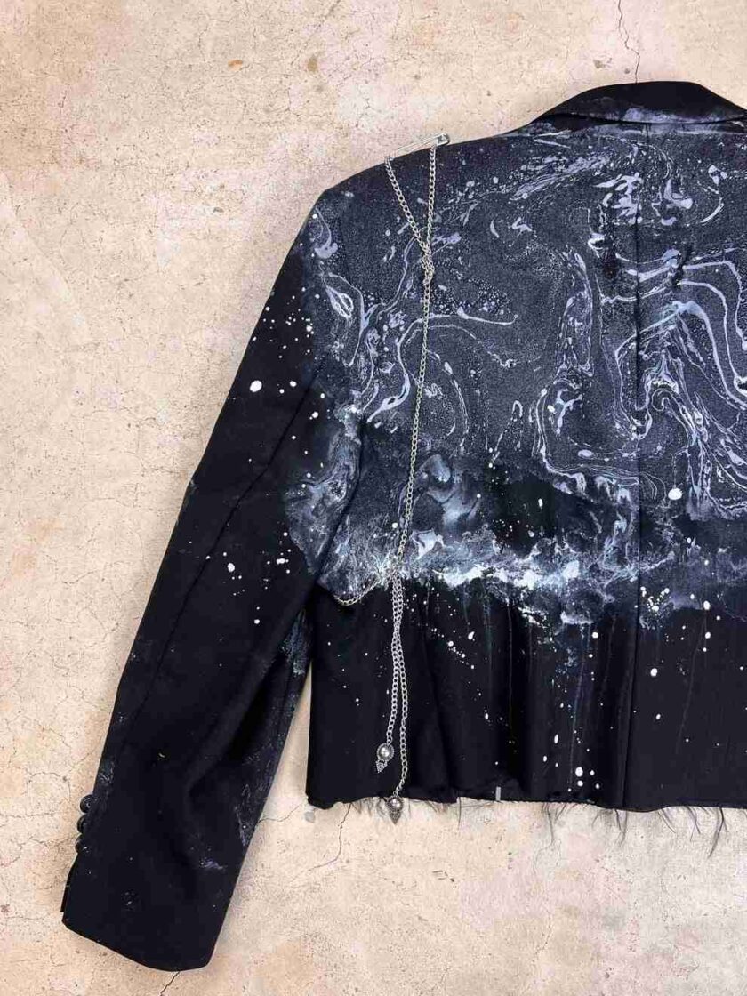 a black jacket with white stars on it.