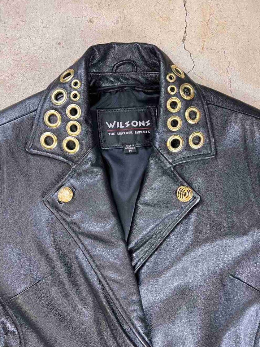 a black leather jacket with gold rivets.