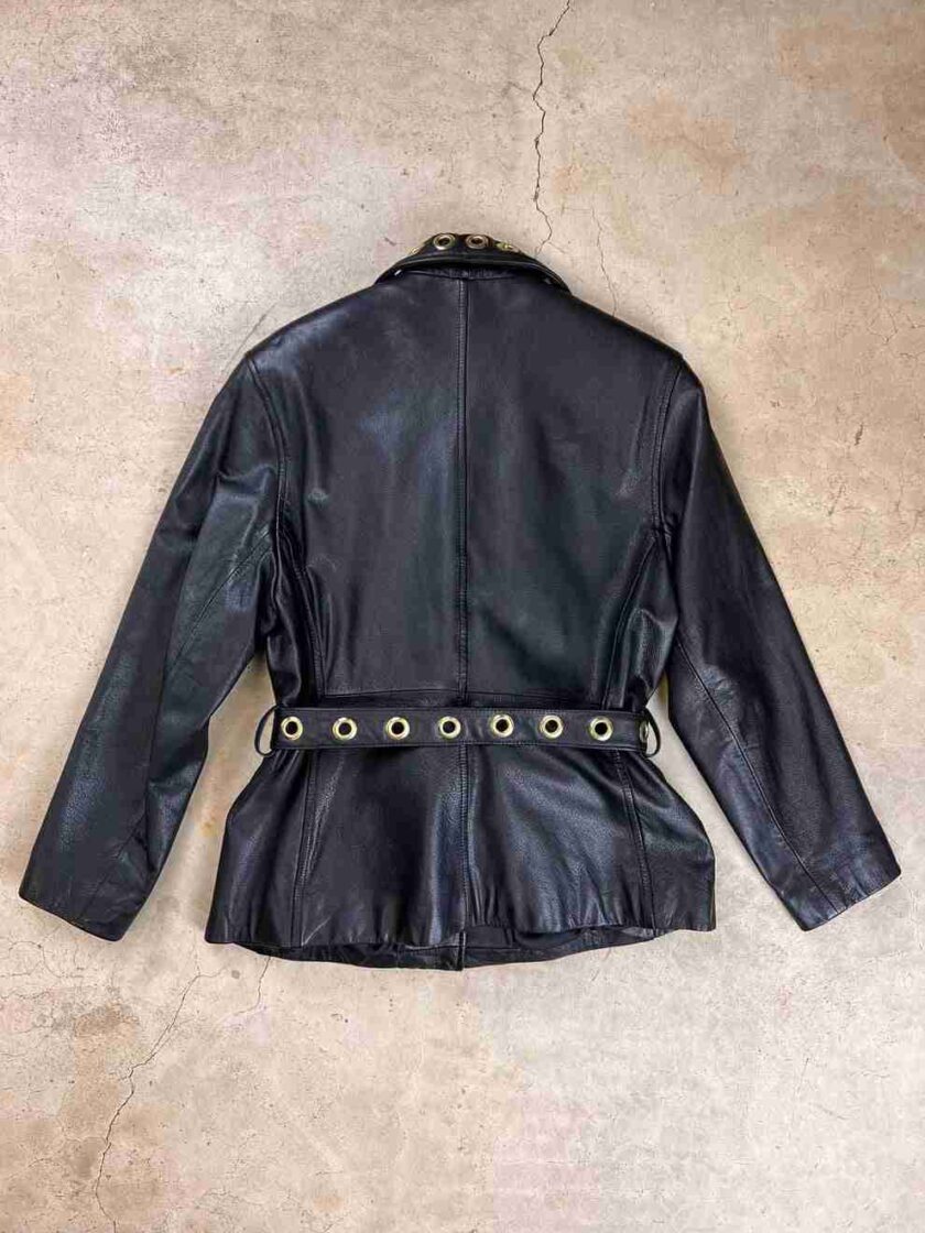 a black leather jacket with a belt.
