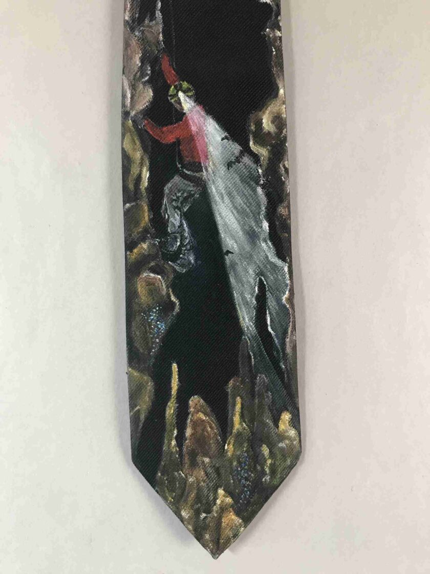 a tie with a picture of a man on it.