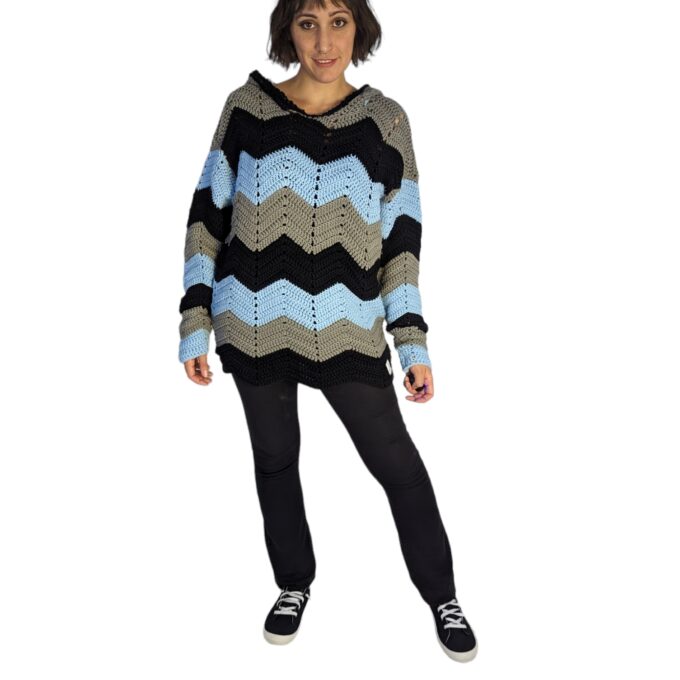 Front view of woman wearing men's crochet hoodie.