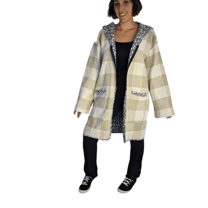 Front view of woman wearing vintage quilt duster.