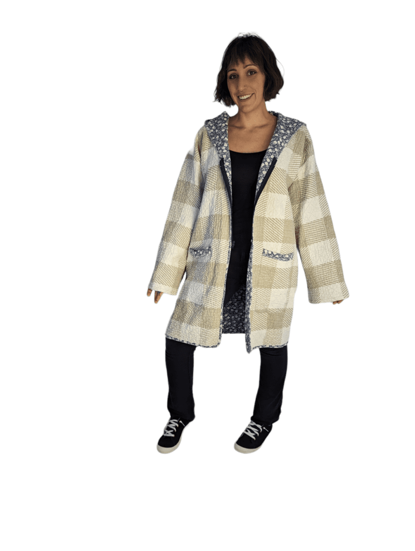 Front view of woman wearing vintage quilt duster.