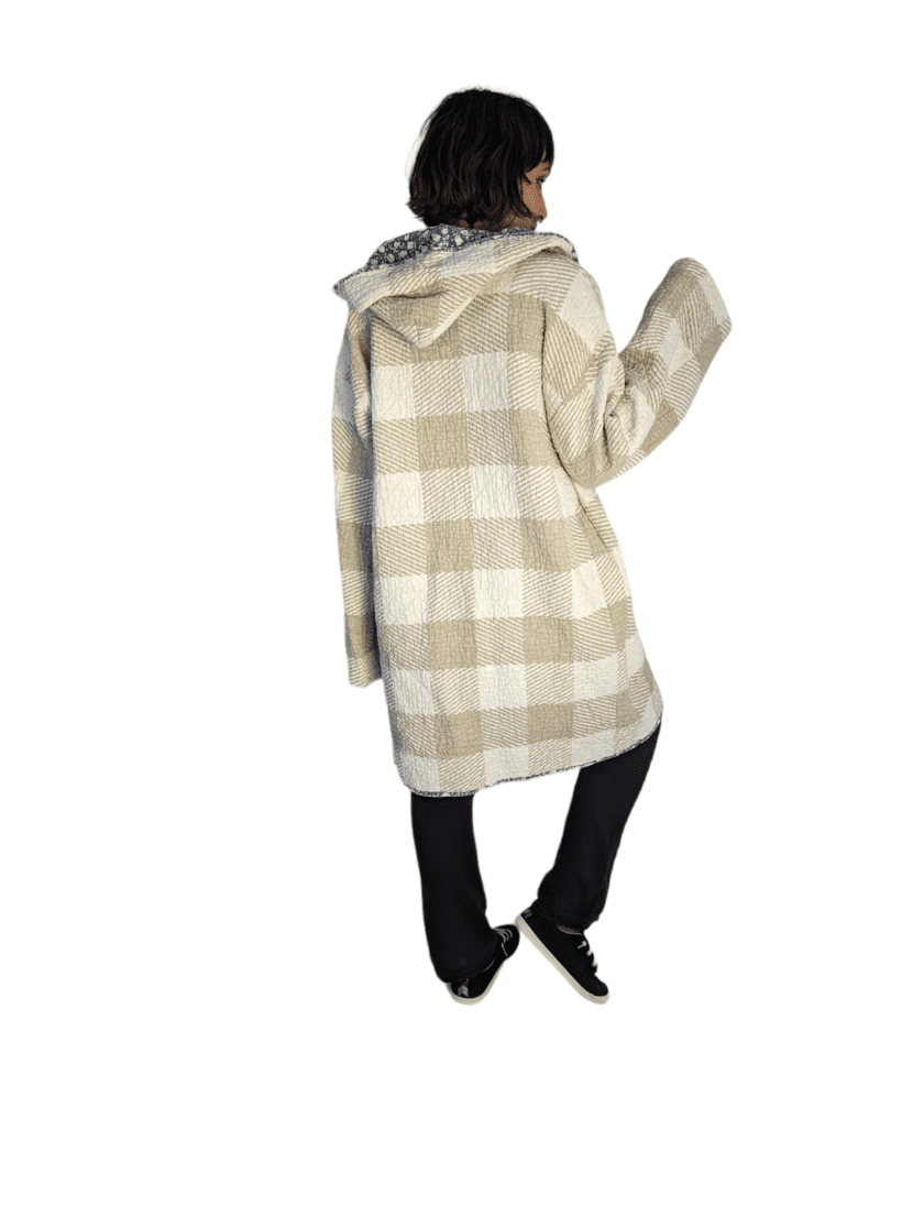 Rear view of woman wearing an upcycled duster coat.