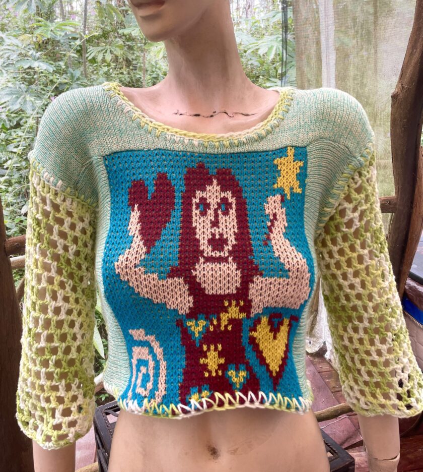A female mannequin wearing a Fairy sweater.