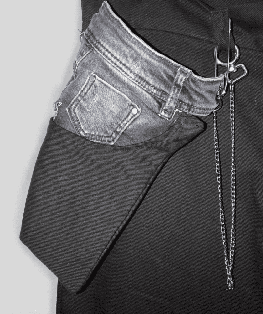 A pair of Bull Denim Up-worked Shorts with a chain attached to them.
