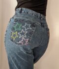 Reworked Vintage Jeans with upcycled embroidered star pockets
