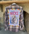 A Stevie Nicks Flannel Long Sleeve Shirt with a picture of a woman on it.