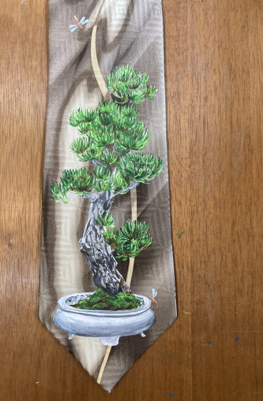 a tie with a bonsai tree on it.
