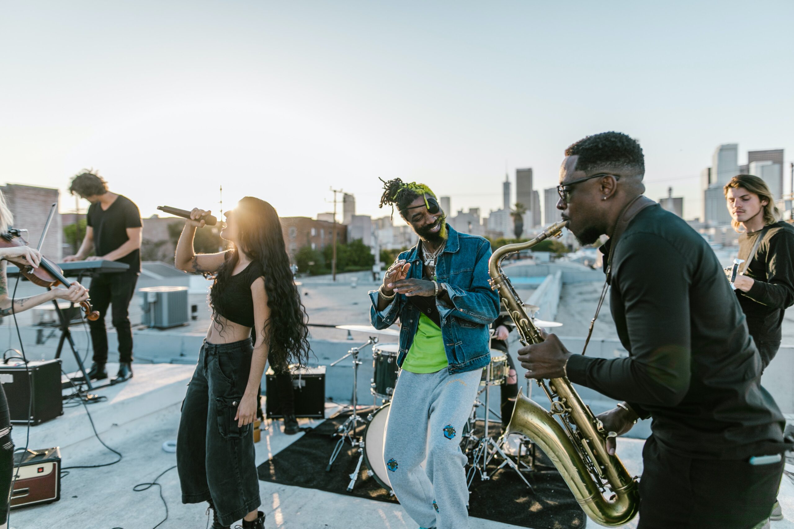 a group of people standing on top of a roof.