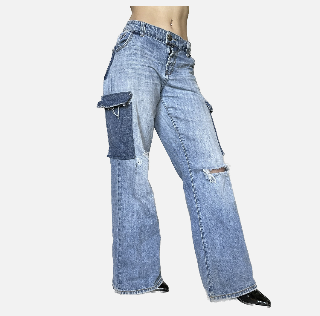 A pair of Denim Two-Toned Baggy Cargo Pants with holes on the side.