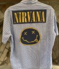 A Nirvana mens pinstriped button up shirt with a smiley face on it.