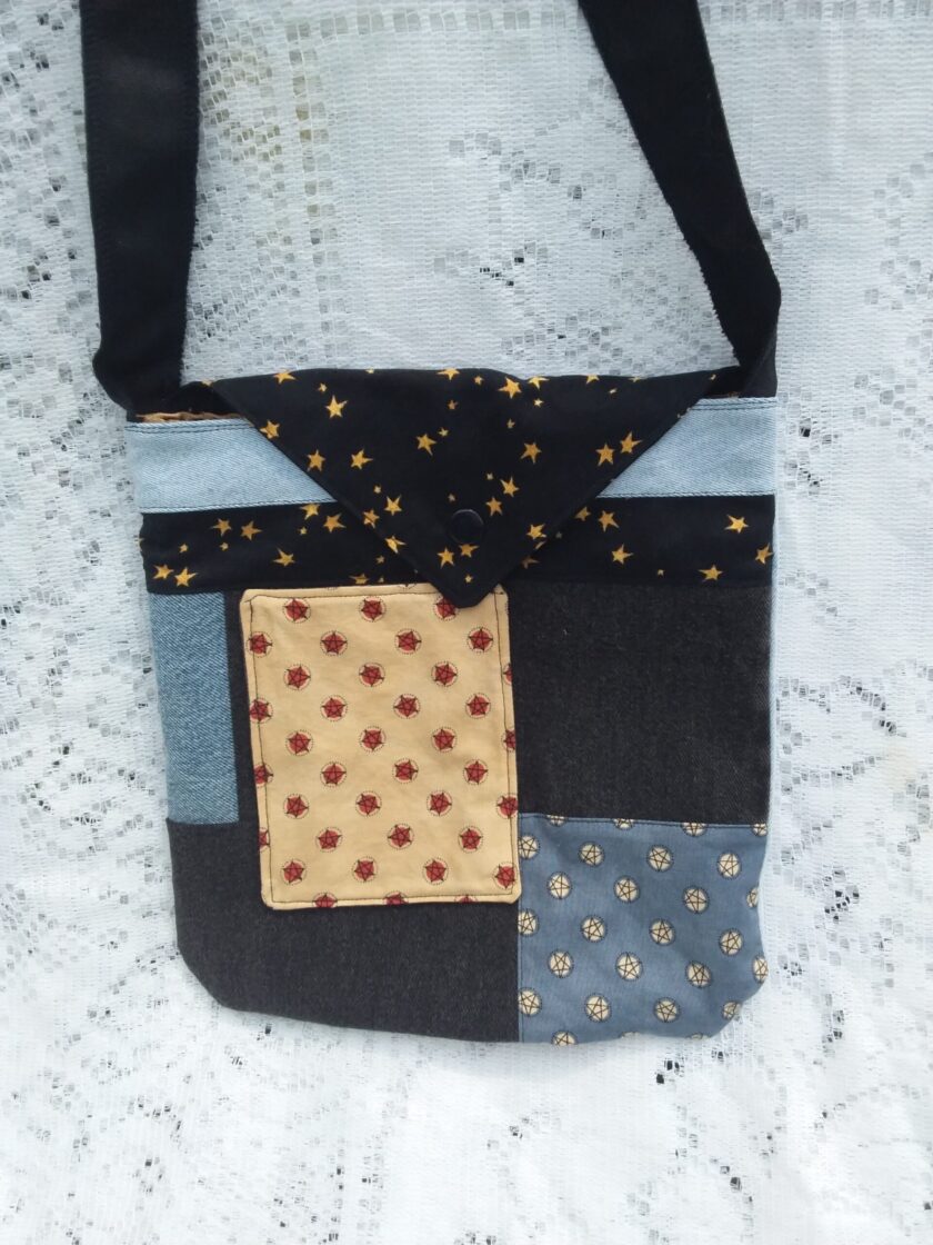 Eco-conscious designer fashion accessory handcrafted from upcycled denim and vintage fabrics
