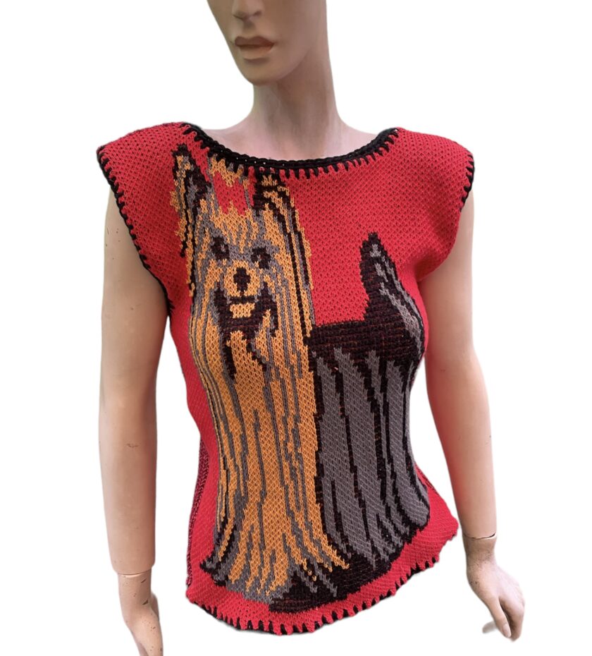 a mannequin wearing a knitted top with a yorkshire terrier on it.