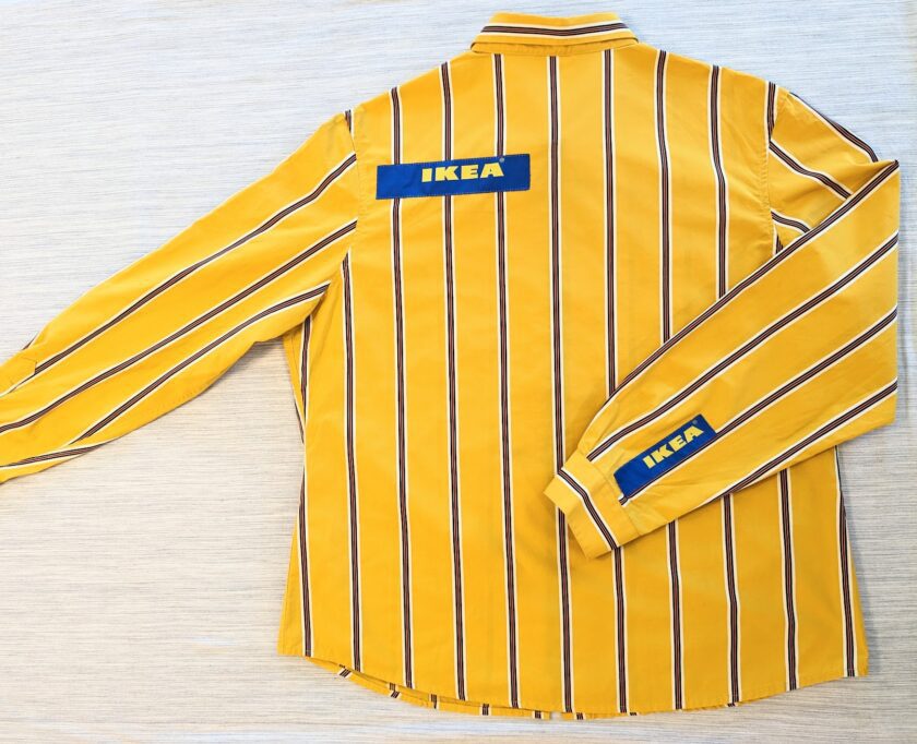 A yellow shirt with blue and yellow stripes.