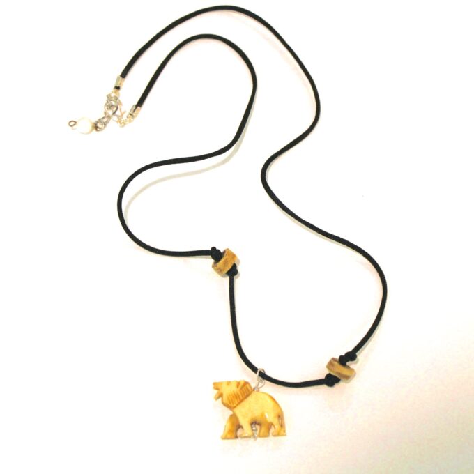 A necklace with a wooden bear on it.