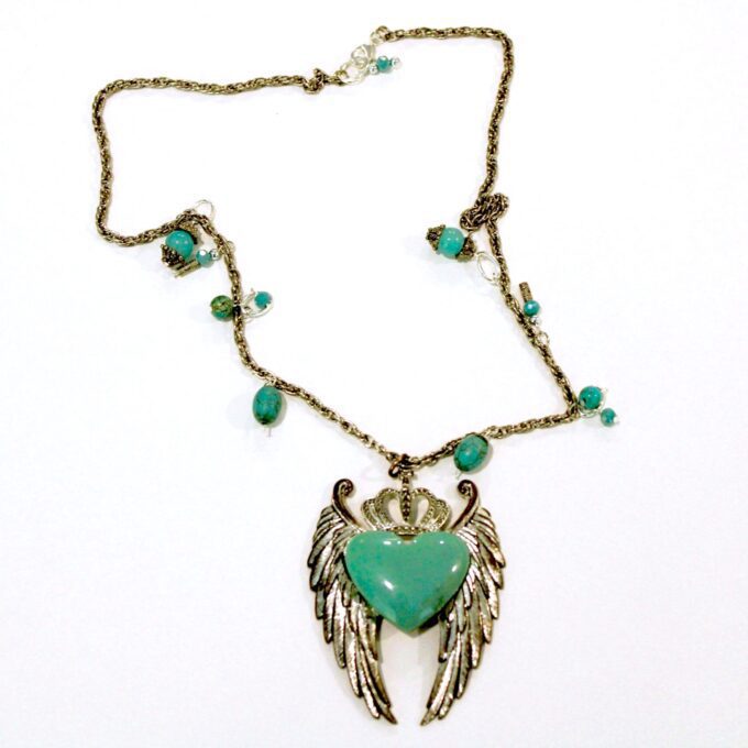 A necklace with an angel wing and turquoise beads.