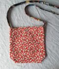 Red hot chili pepper fabric hand bag with a long strap