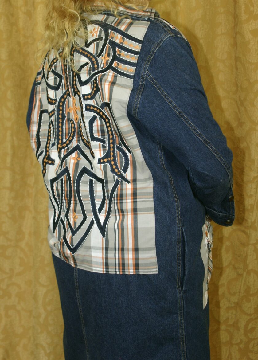 A woman wearing a denim jacket.