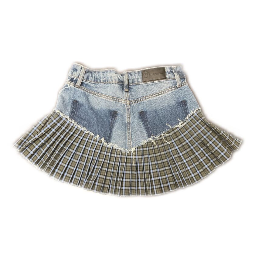 A denim skirt with a plaid pattern.