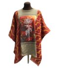 A women's poncho with an image of a rose on it.