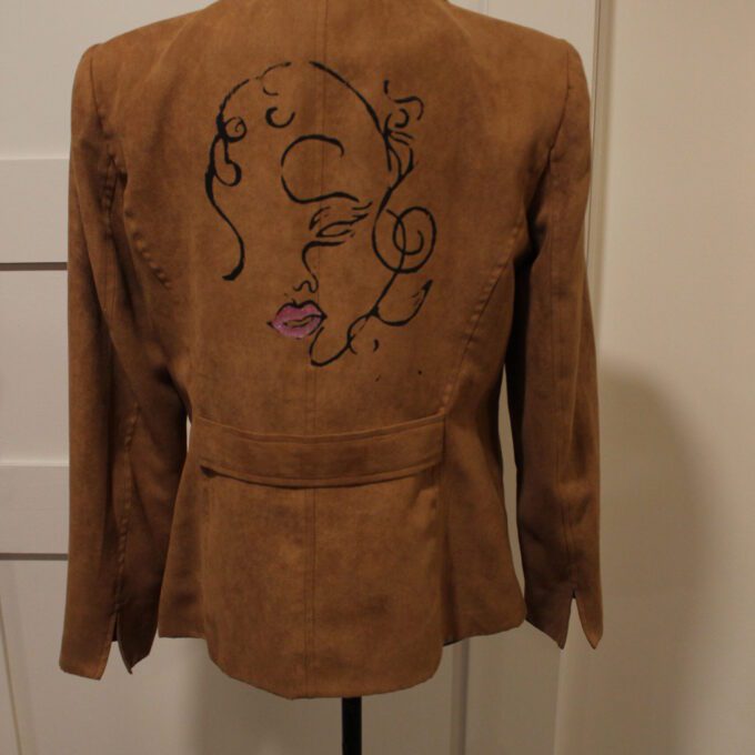 A brown jacket with a silkscreened face on it.