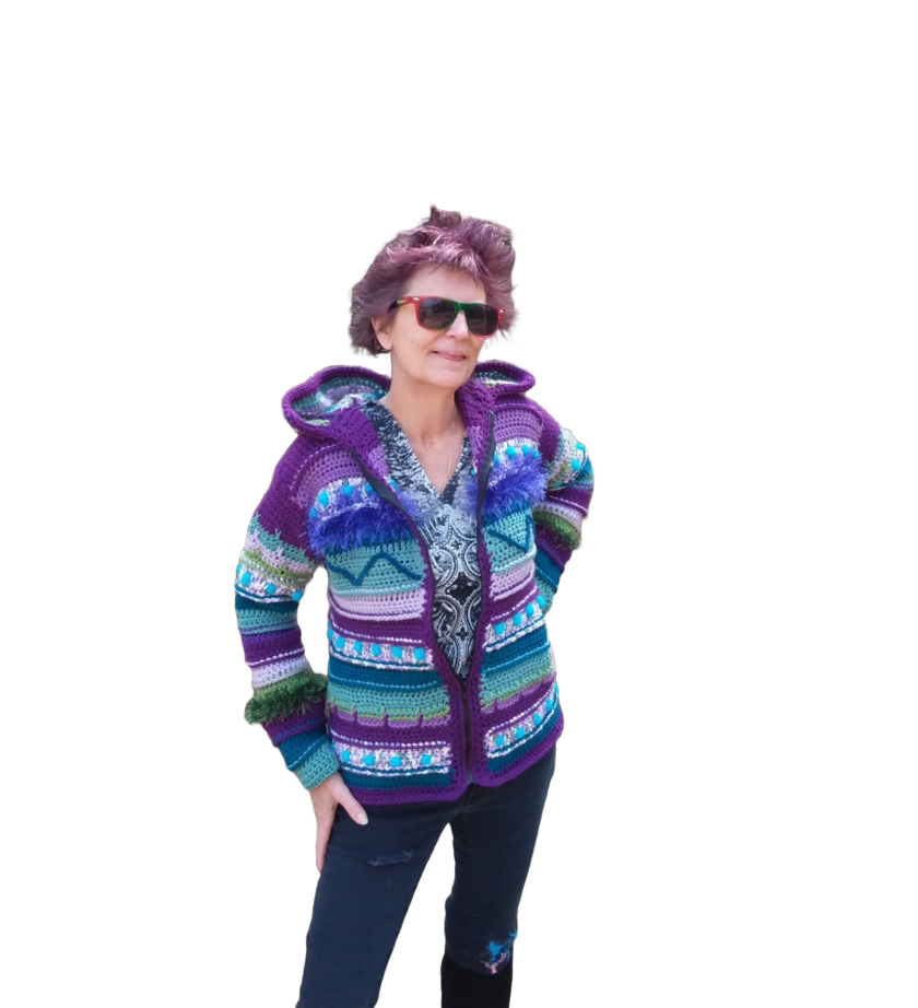 A purple, blue and green crochet cardigan sweater with hood