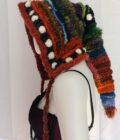 A wool and alpaca yarn crochet elf hood with long ties