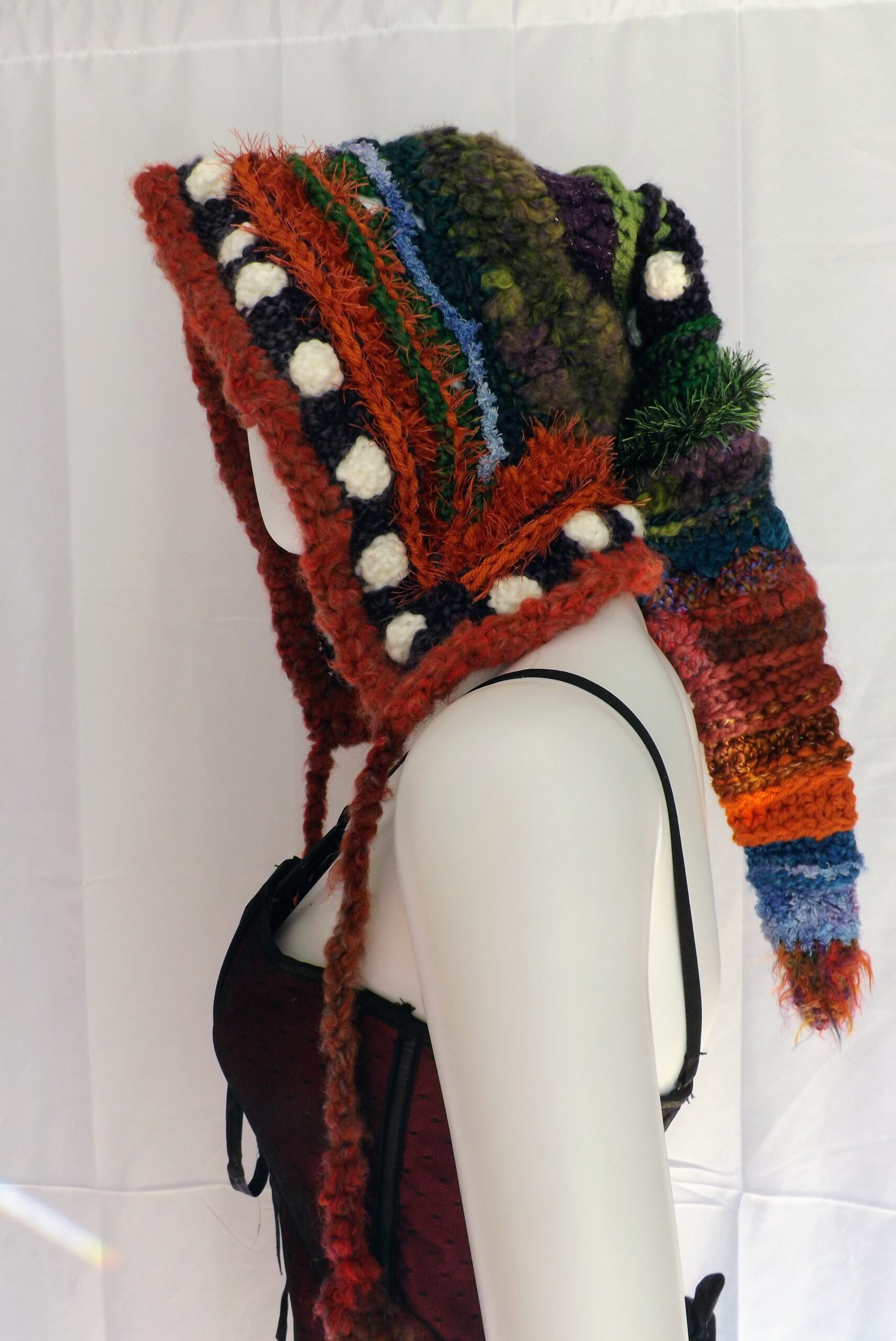 A wool and alpaca yarn crochet elf hood with long ties