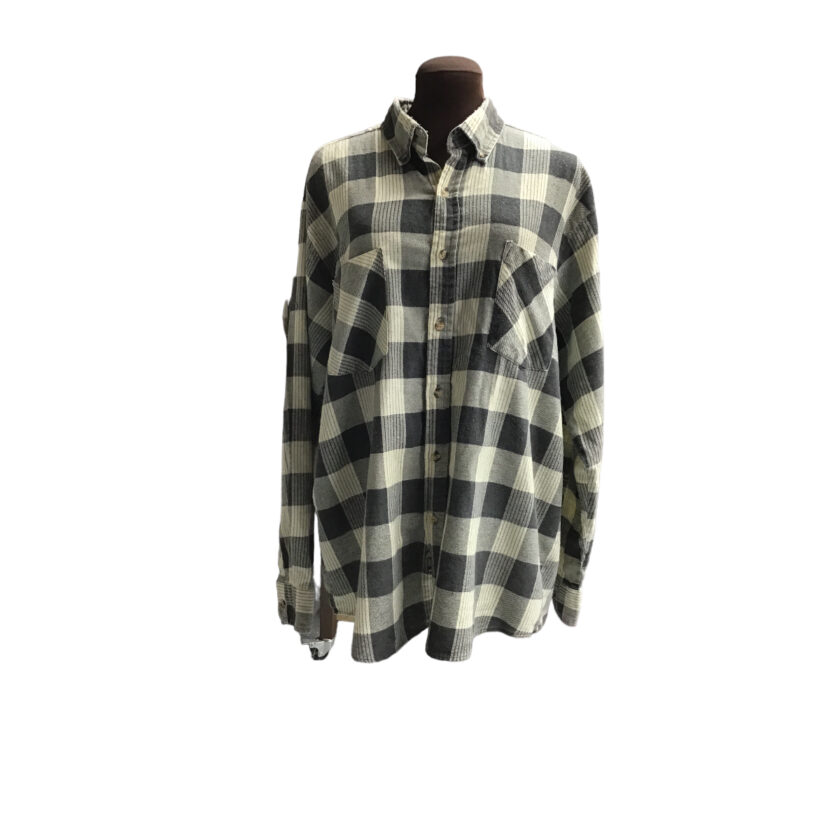 A black and white checkered shirt on a mannequin.