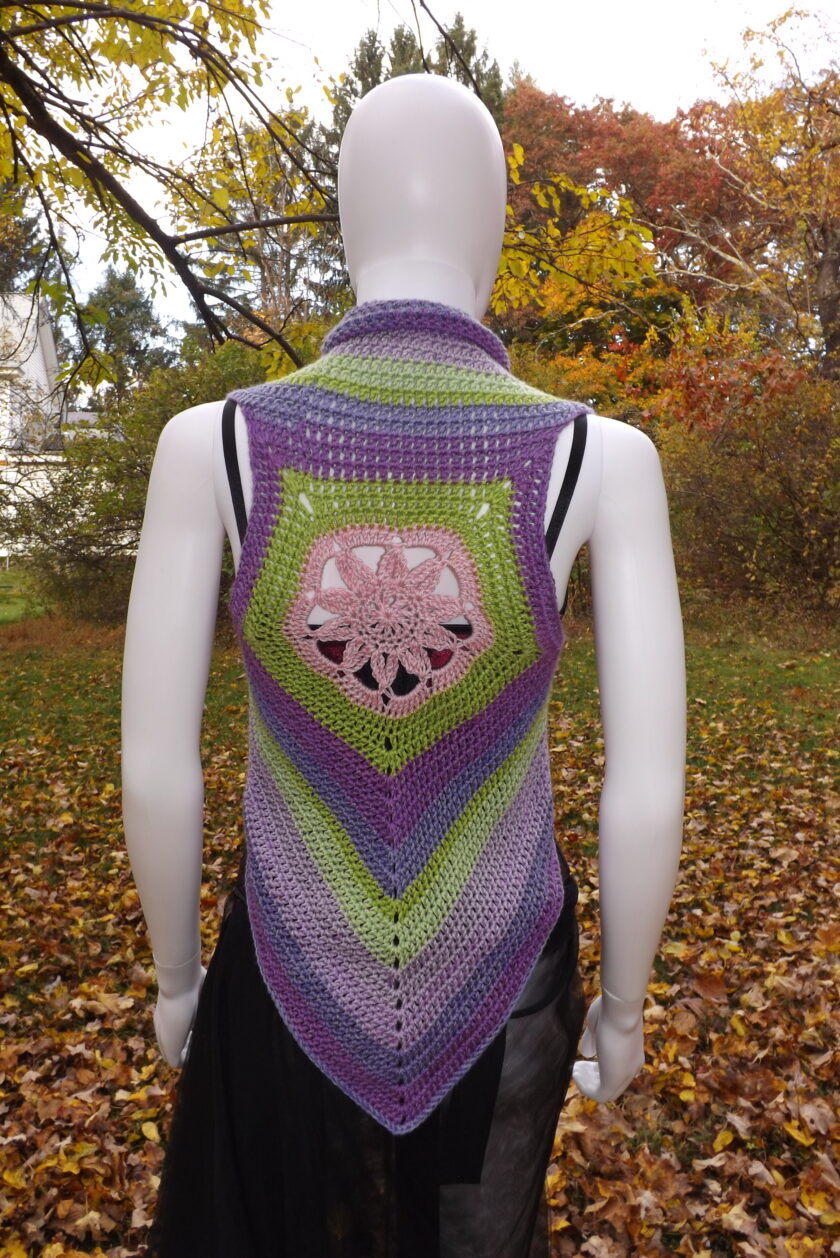 Lotus flower crochet crop top vest in pastel shades.