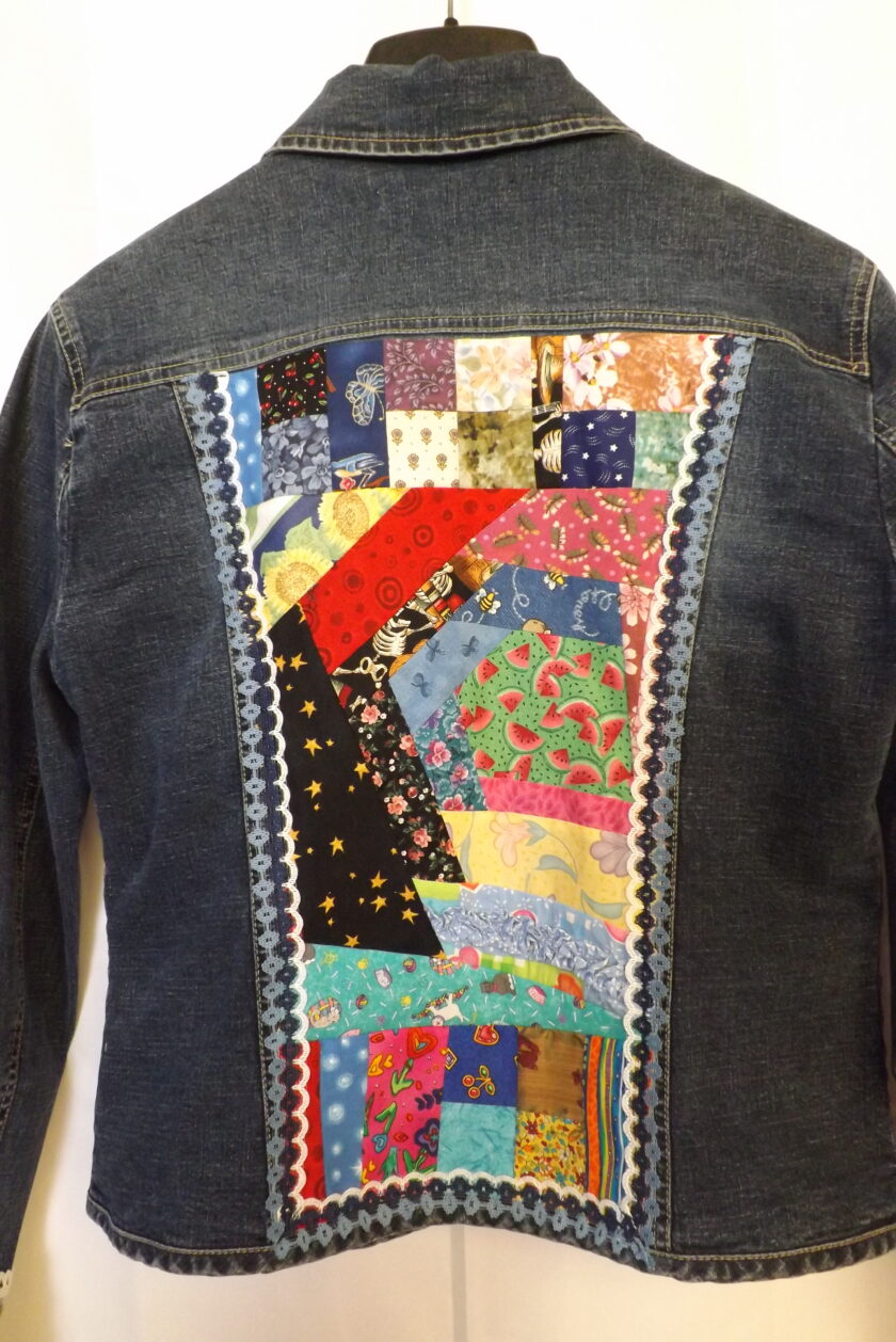 A cottagecore patchwork denim jacket