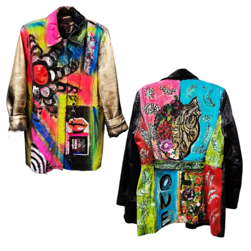 A colorful leather jacket with different designs on it.