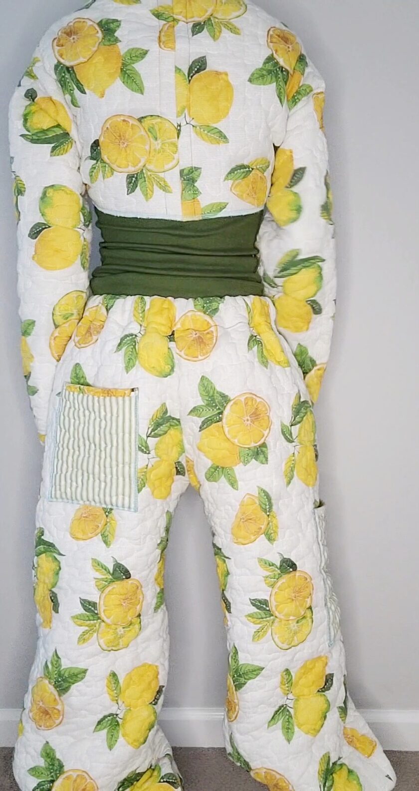 A mannequin with a lemon print on it.