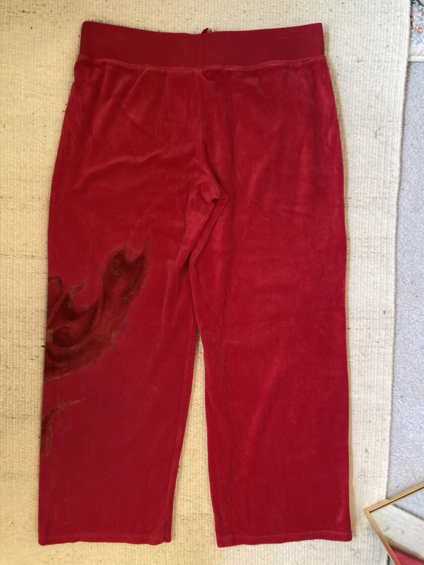 A pair of hand-painted red sweatpants.