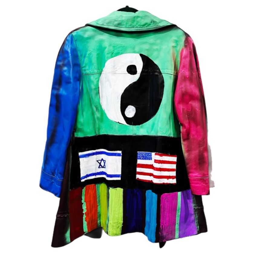 A colorful jacket with a yin - yang symbol on it.