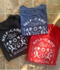 Three t - shirts that say self care club.