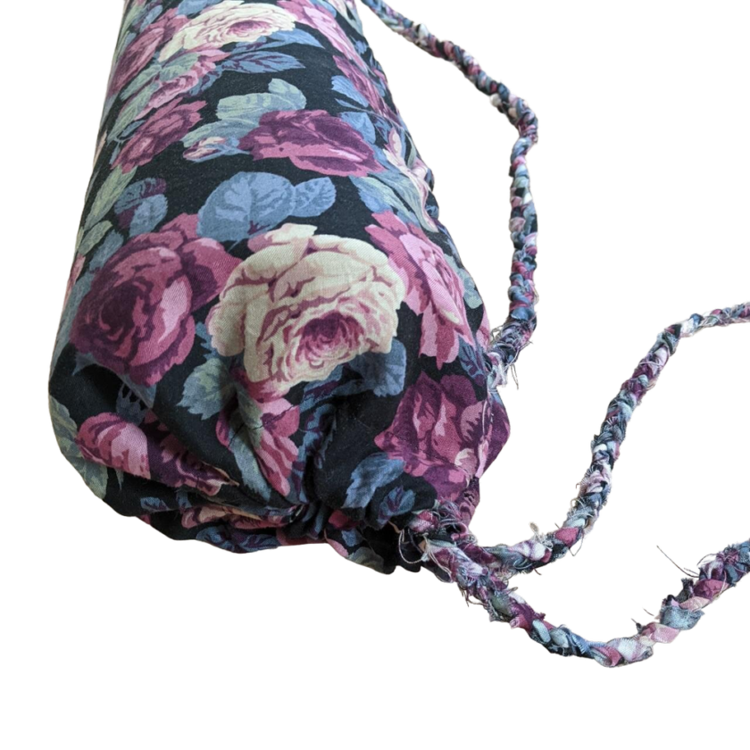 A yoga bag with a floral pattern on it.