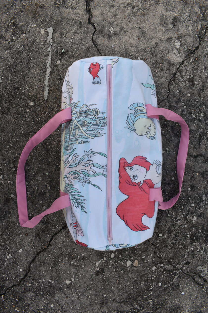 The little mermaid duffel bag.