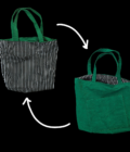 Two green and black striped tote bags on a black background.