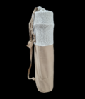 A yoga mat bag with a strap.