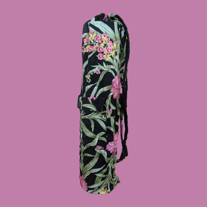 A black and pink cover with a floral pattern.