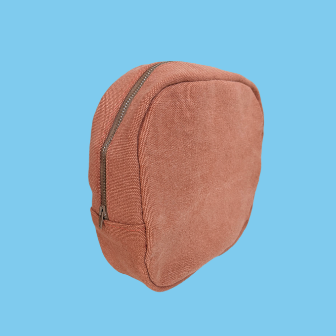 A round brown bag with zipper.