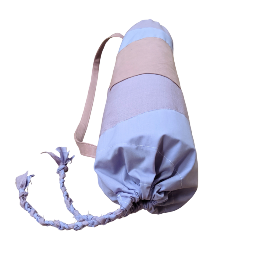 A yoga bag with a pink and blue stripe on it.