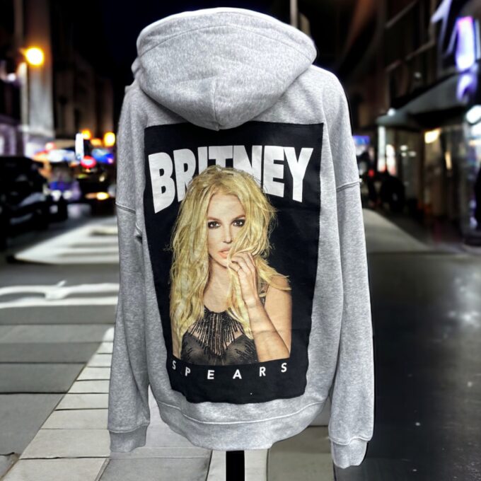 A grey hoodie with a picture of britney on it.